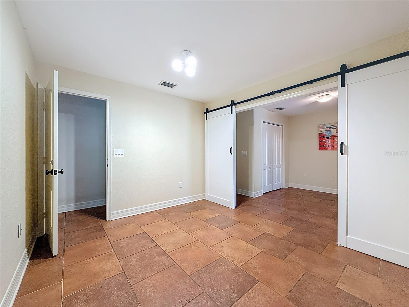 Bonus Room - Bedroom 3 doors open