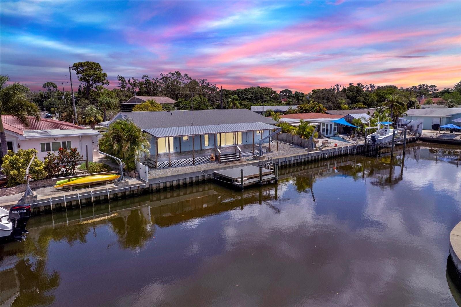 Virtually Staged Twilight Canal front home