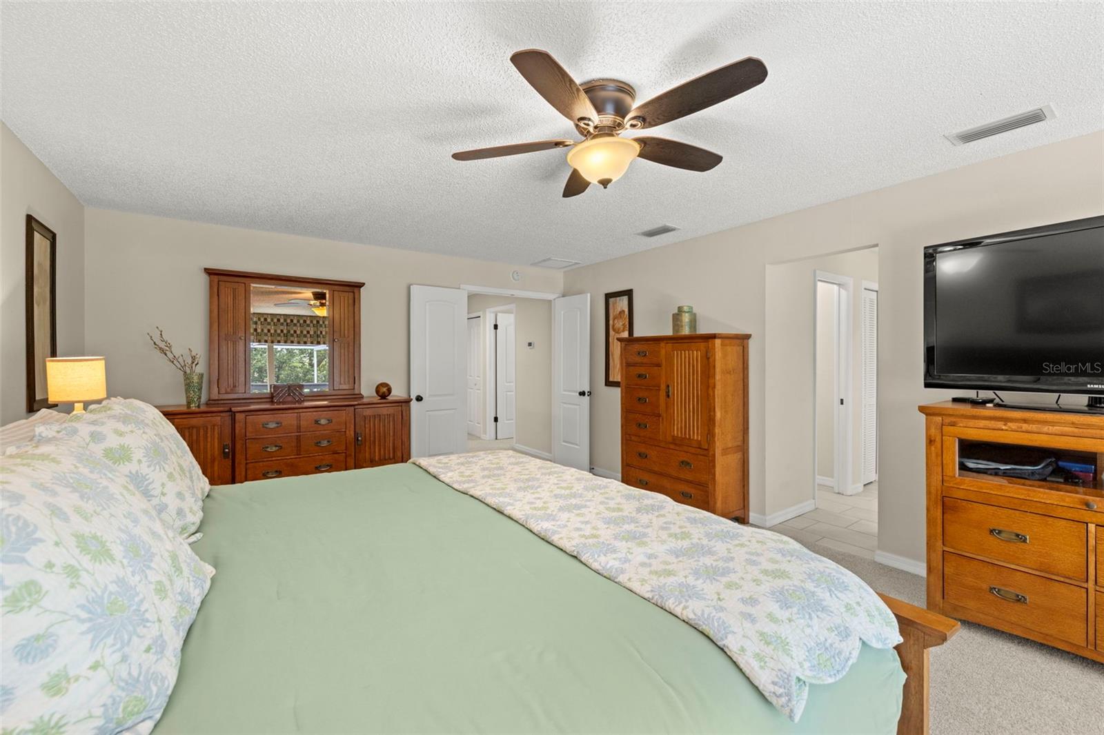 Primary Bedroom with En-Suite Bath & Balcony