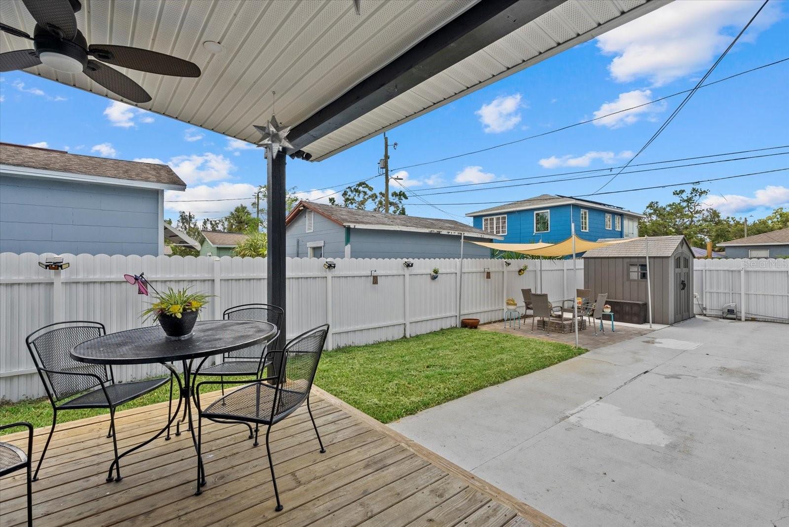 Patio and private back yard with gate access from alley for the Main Home