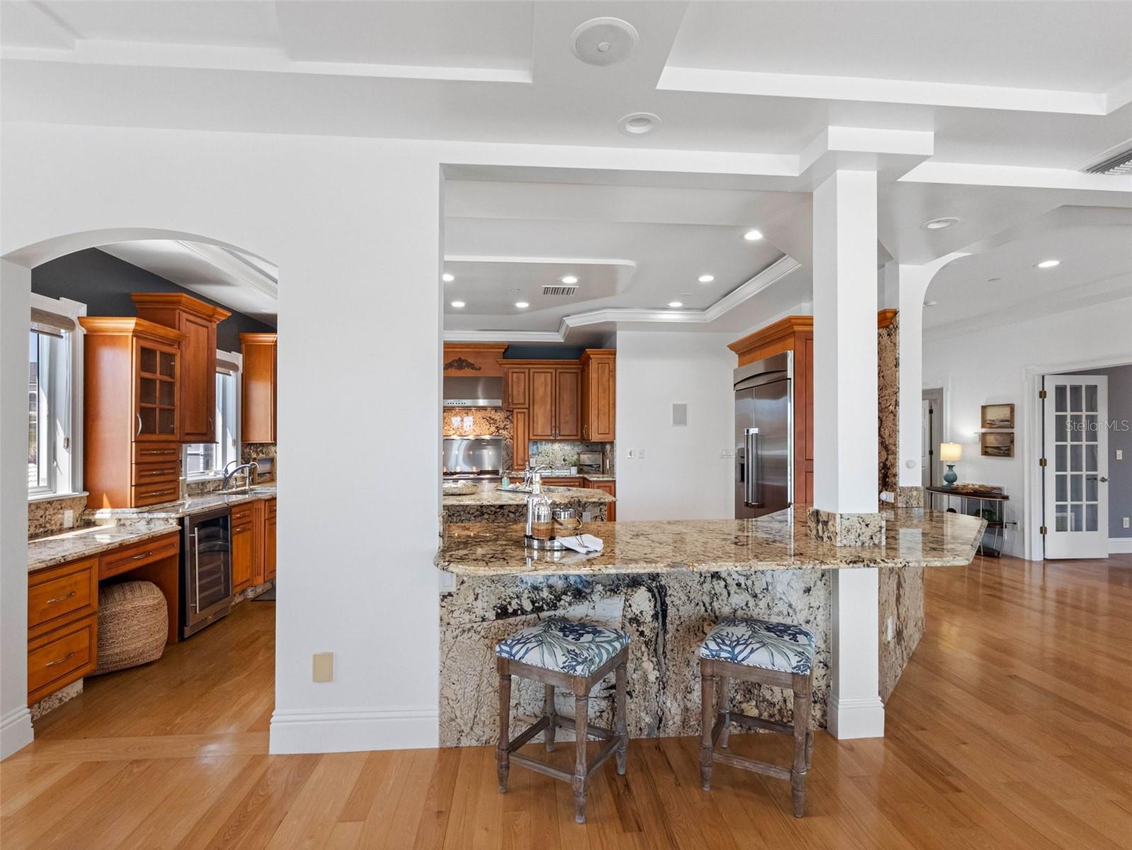 Kitchen is open to the living and dining areas.