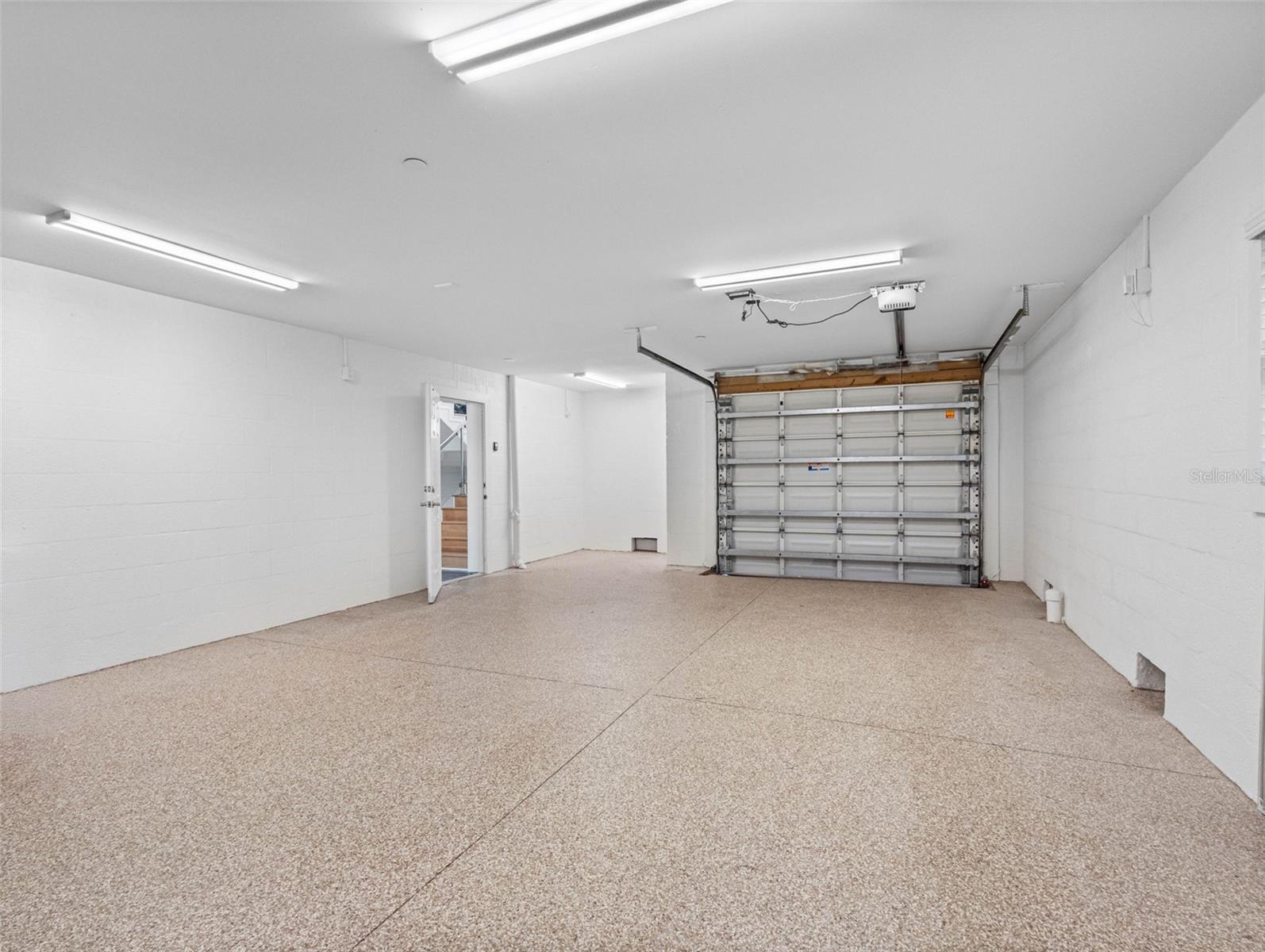 Second garage with epoxy flooring.