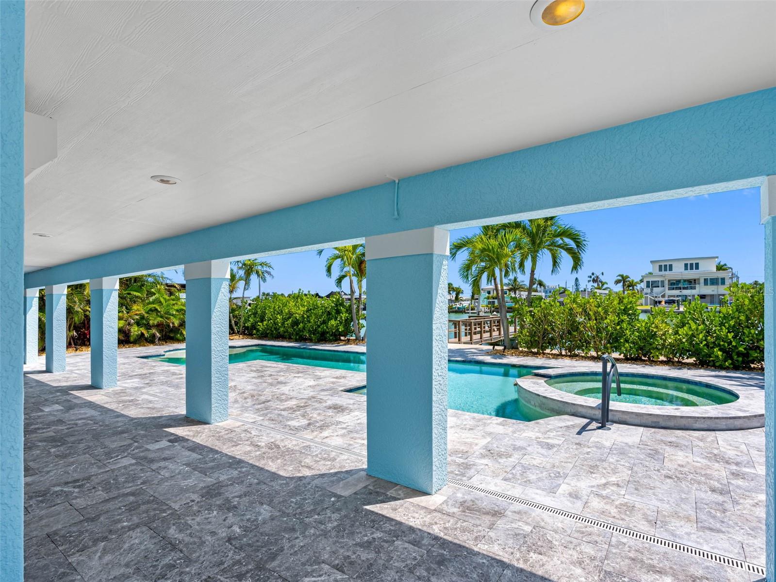 Covered lanai with plenty of room for an outdoor kitchen and bar.