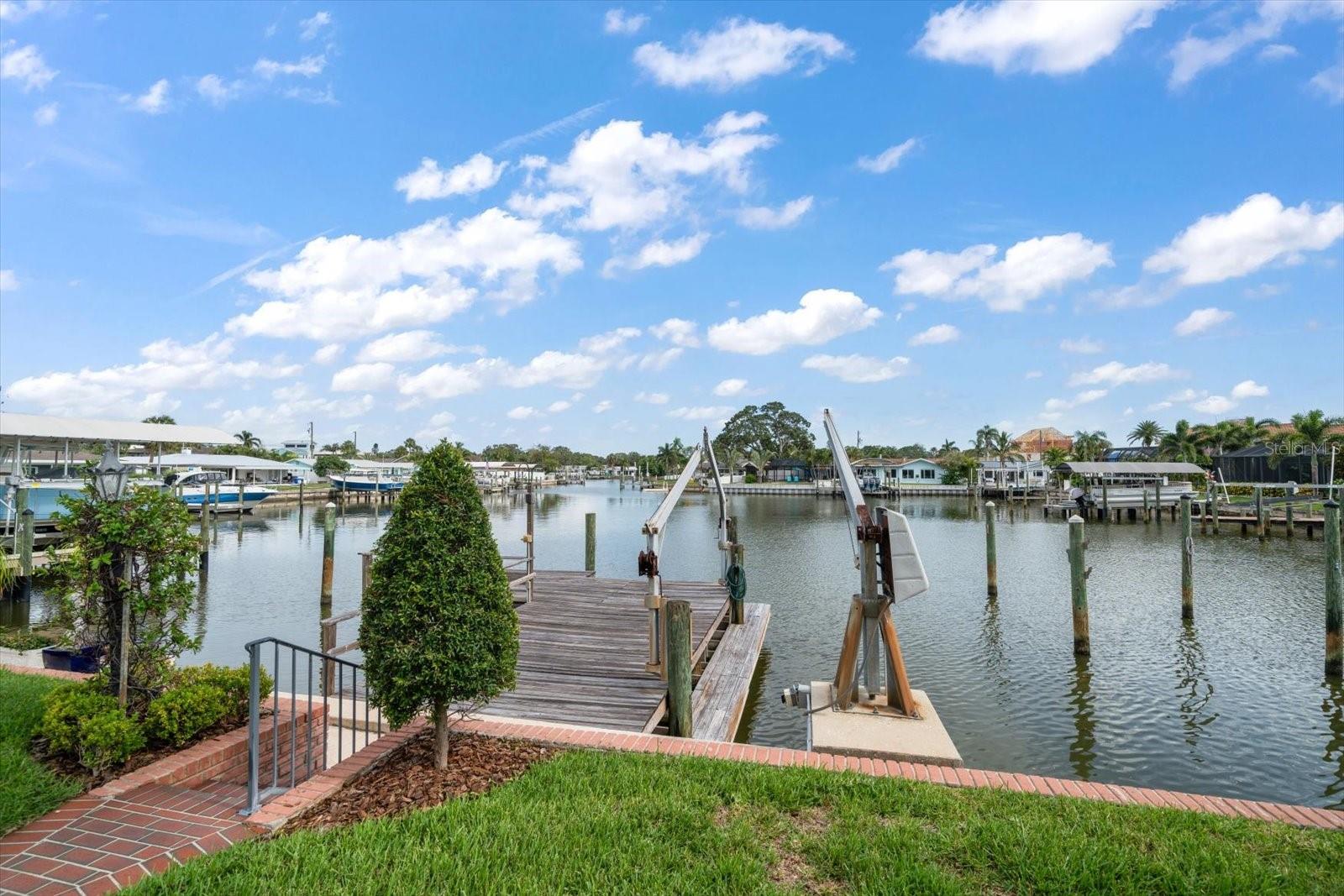 Protected lagoon, moor your sailboat or add a lift and bring your powerboat. 80' wide lot, plenty of options!