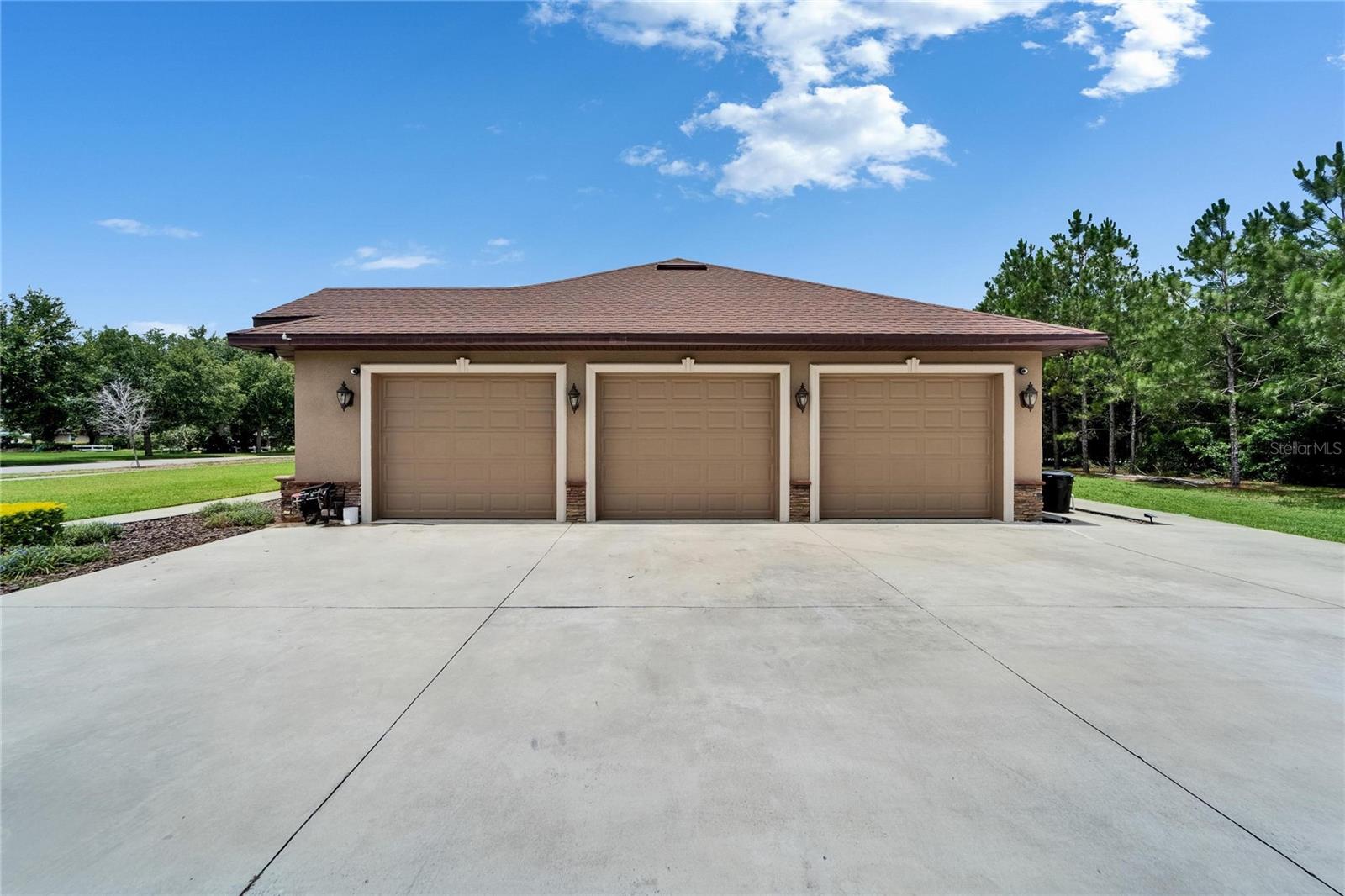 With 3 garage doors and space for 4 cars you'll fall in love with the 4 car garage!