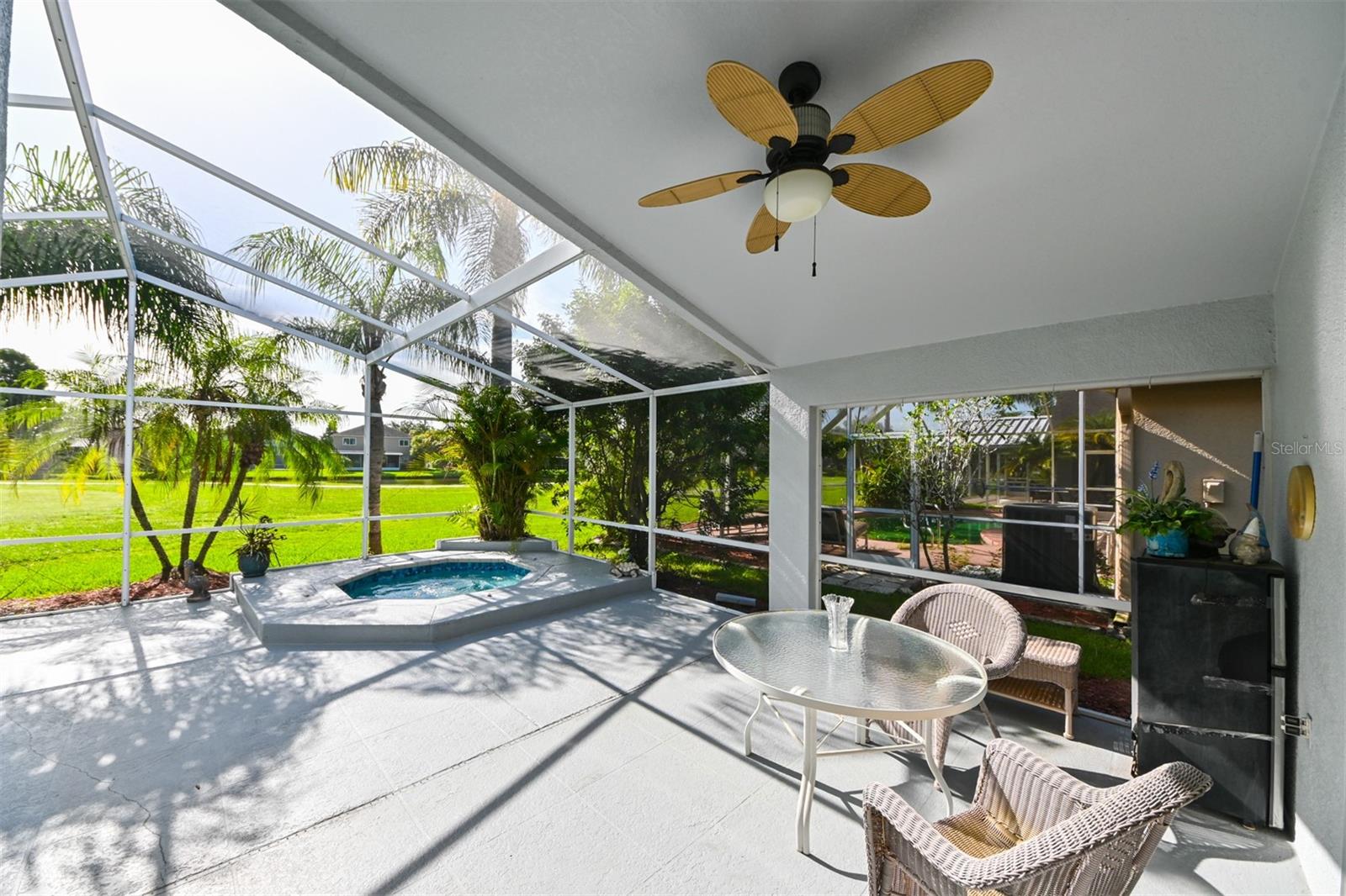 Back patio showing in ground spa