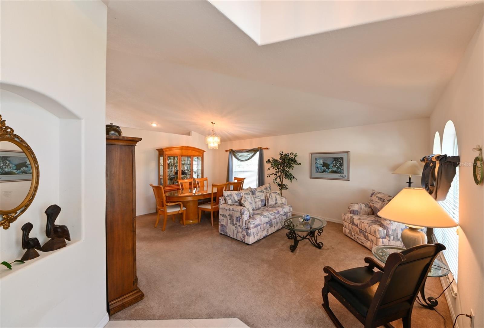 View into the Living Room and Dining Area from the front door