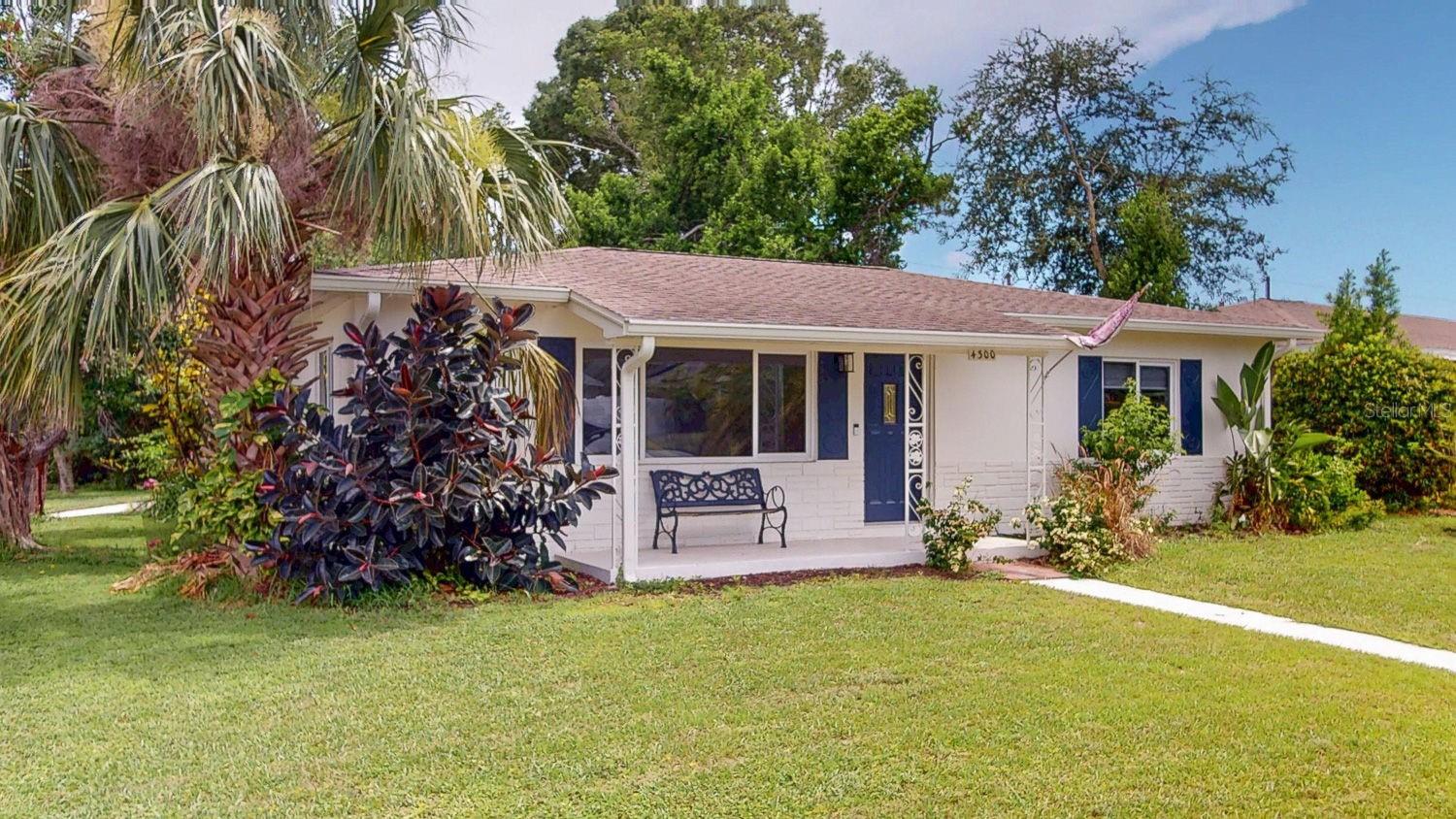 side view, lovely yard and curb appeal