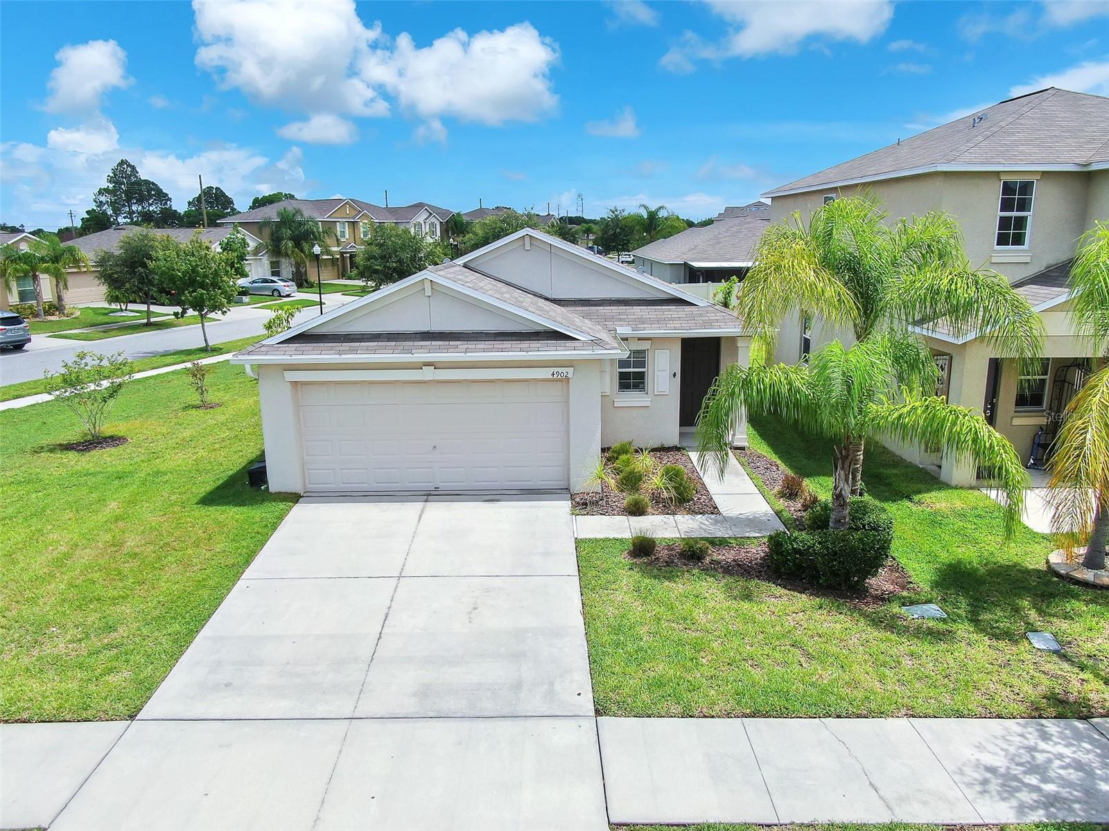 $100 HOA Dues includes resort-style amenities: a gated pool, splash pad, hot tub, hammocks, fitness center, tennis courts, and playground— AND also cover lawn care for your own lot!