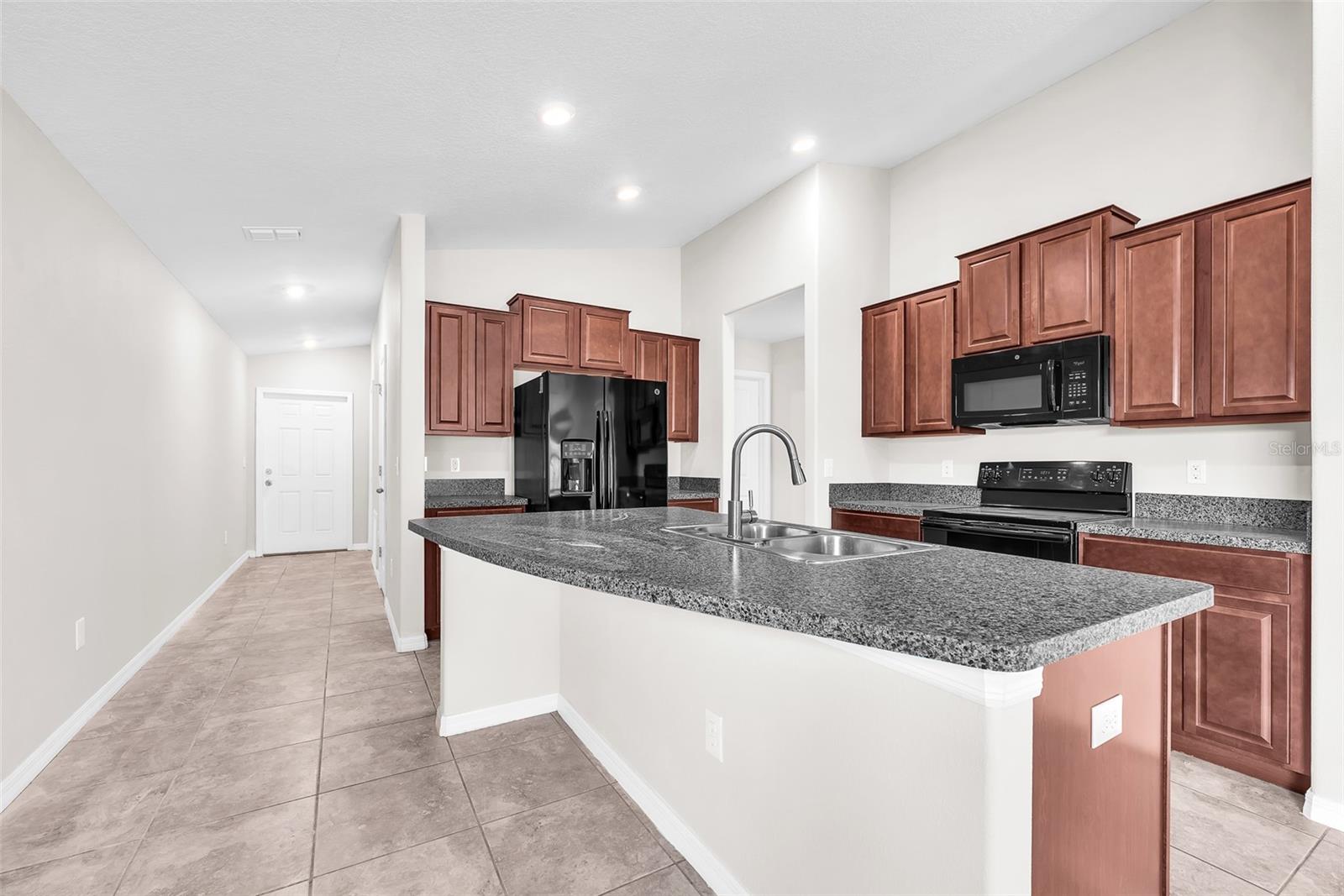 There is a generous pantry and plenty of storage in this kitchen.