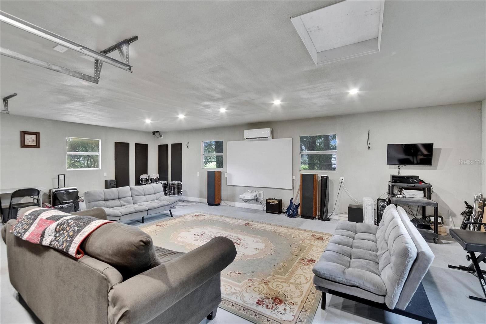 nside Detached Garage/Workshop/Office ..  This area has electric and AC.