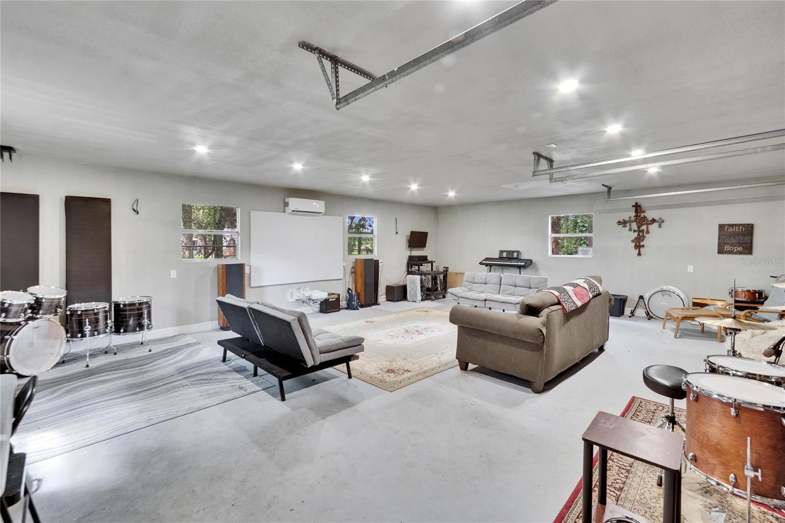 nside Detached Garage/Workshop/Office ..  This area has electric and AC.