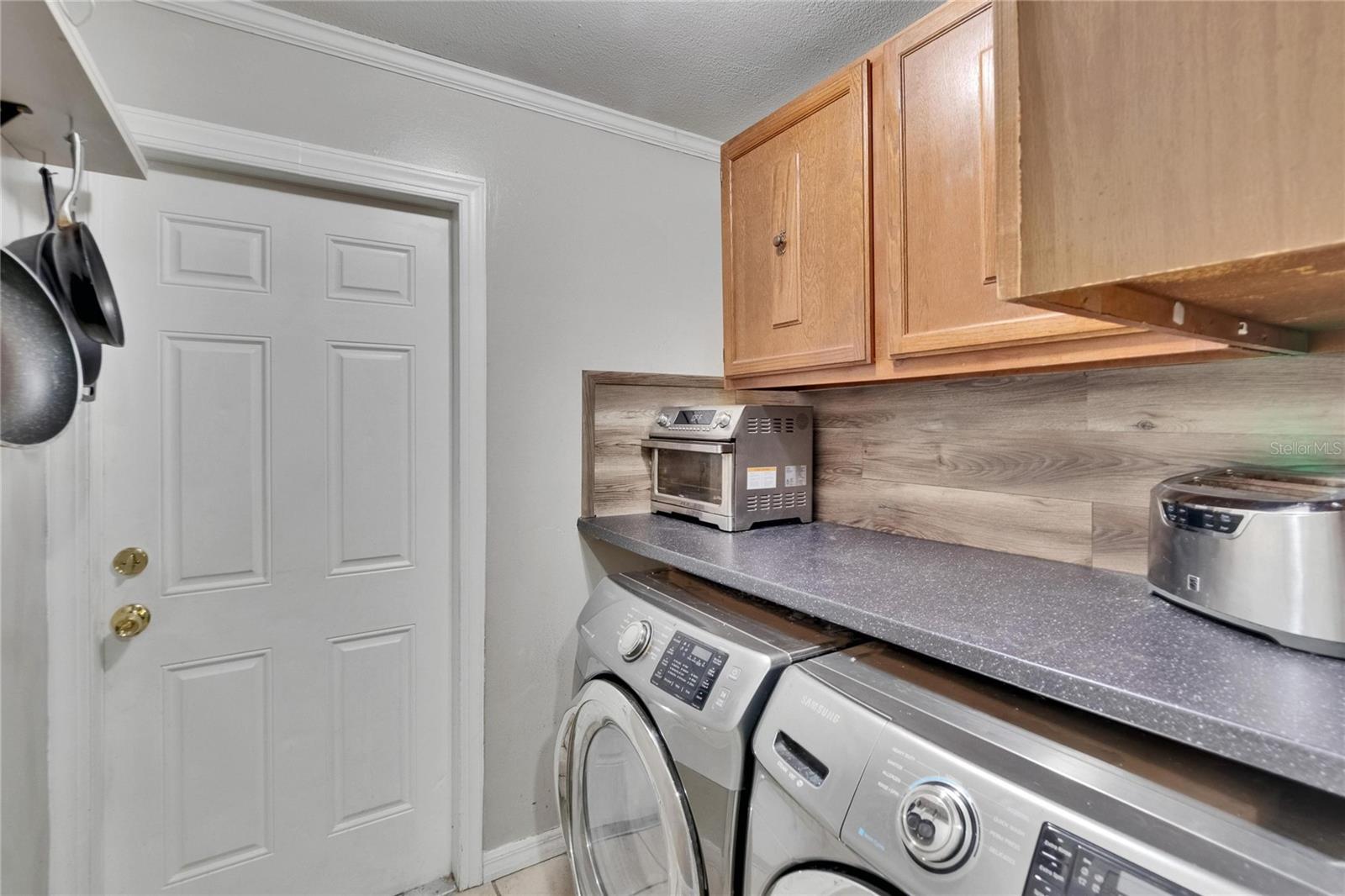 Laundry Room, Door access to Attached Garage