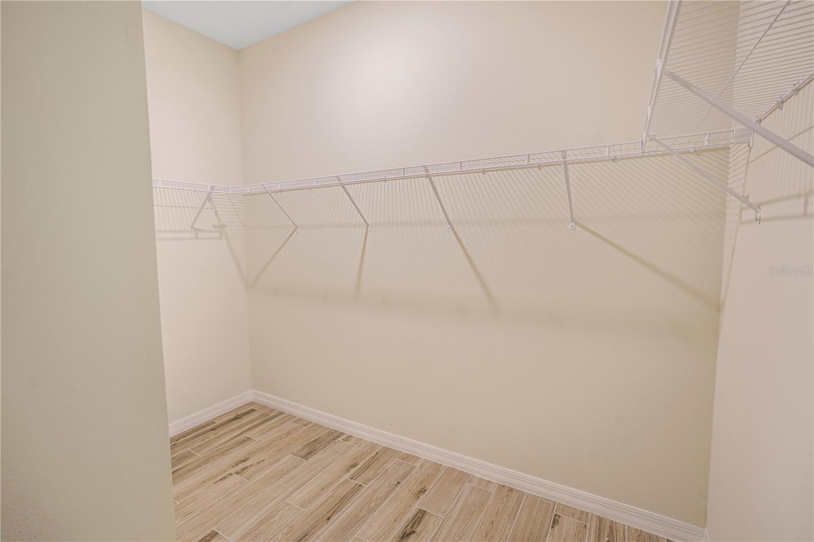 PRIMARY WALK IN CLOSET