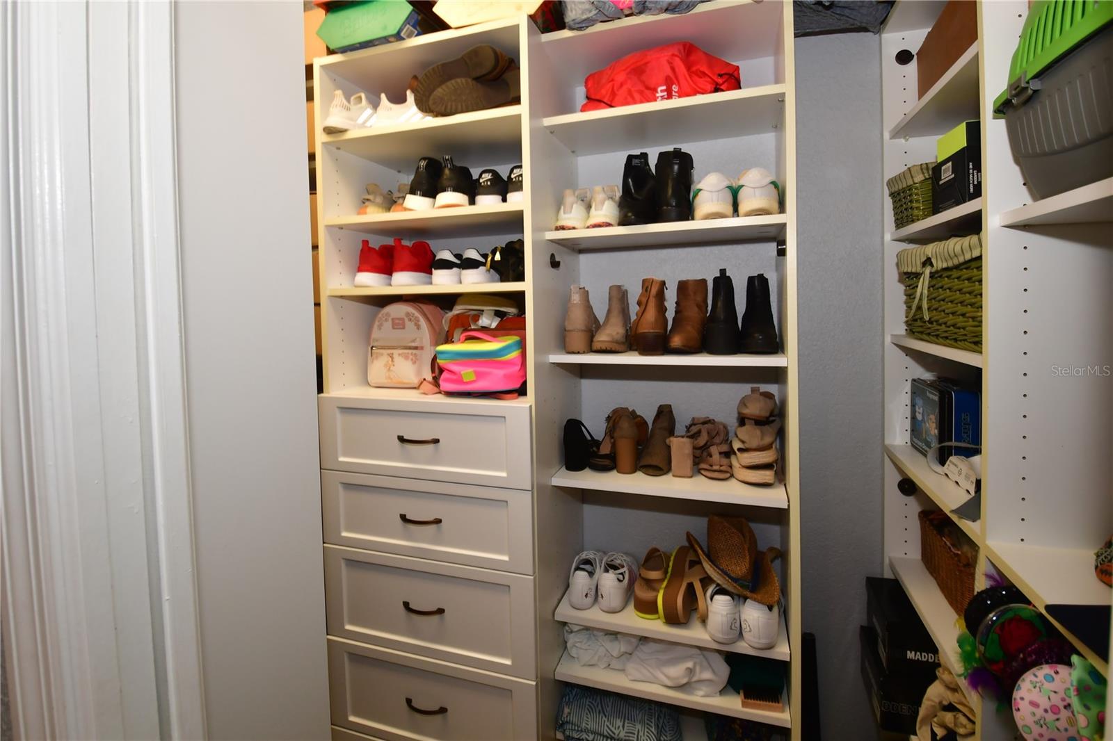 Walk in closet with California closet system