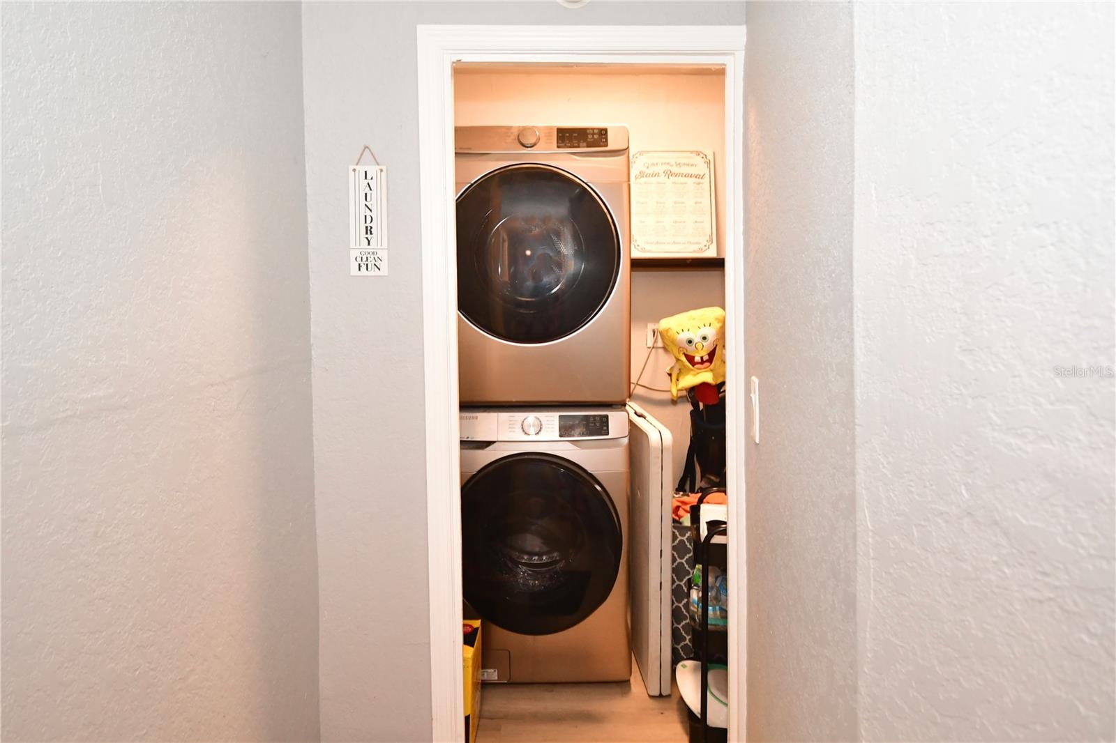 Place for washer and dryer and some storage too