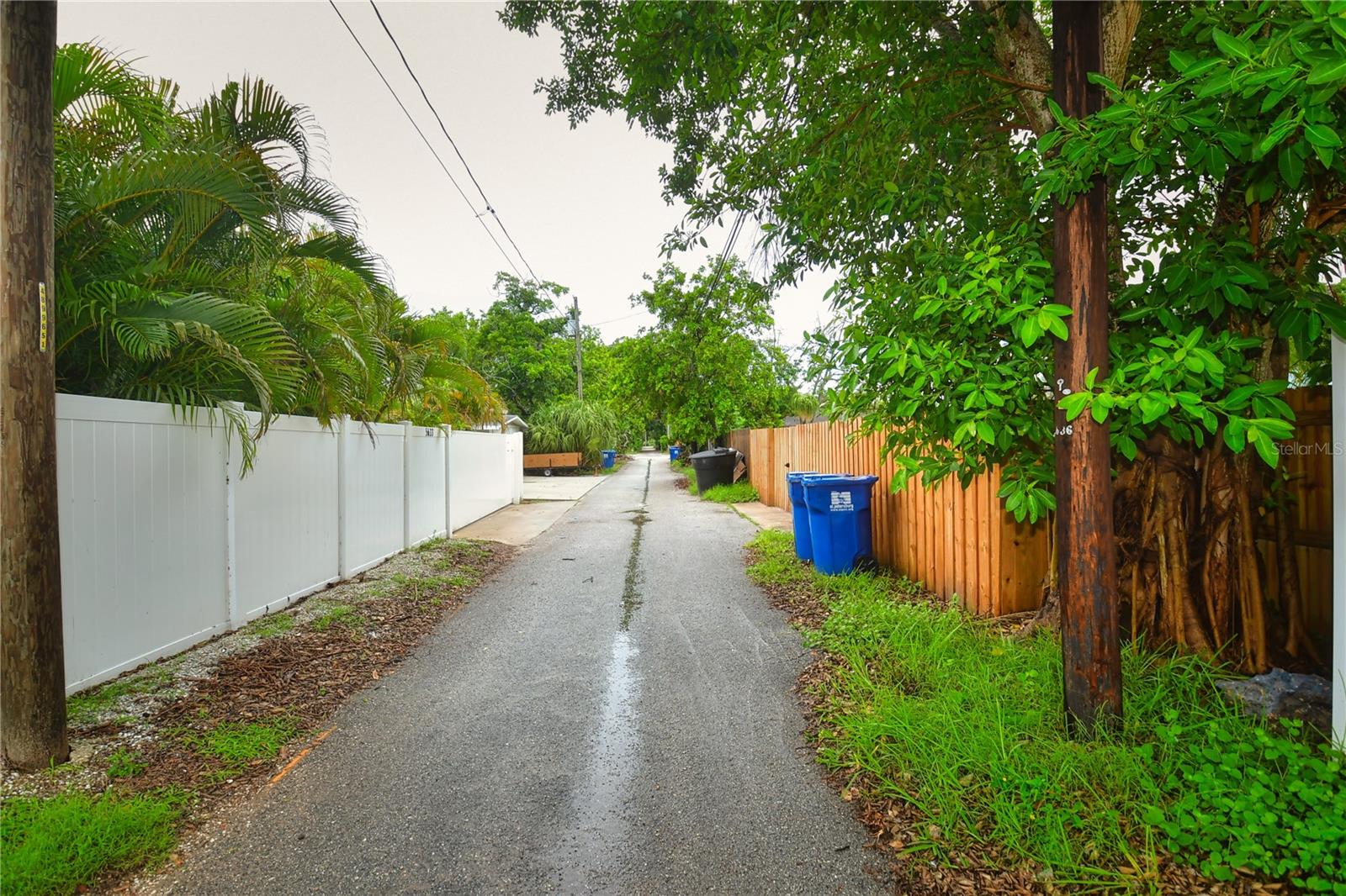 Alley behind dual gate access to yard