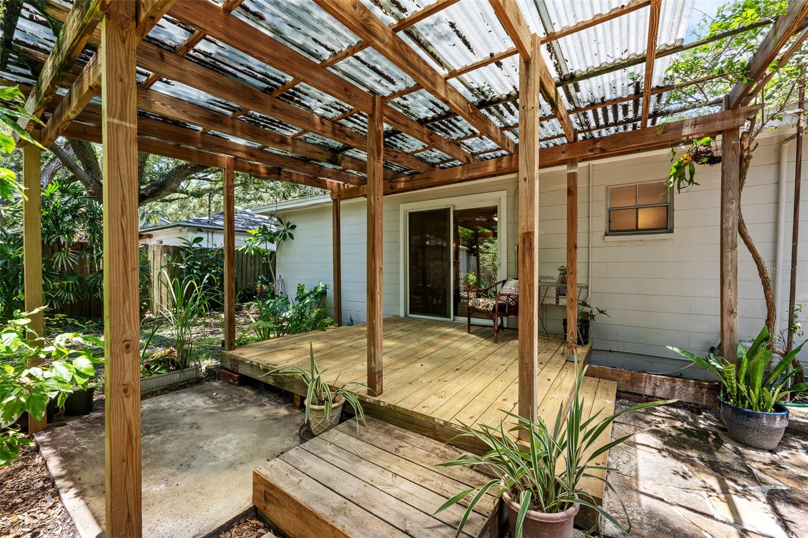 Newly rebuilt covered deck to enjoy your beautiful backyard