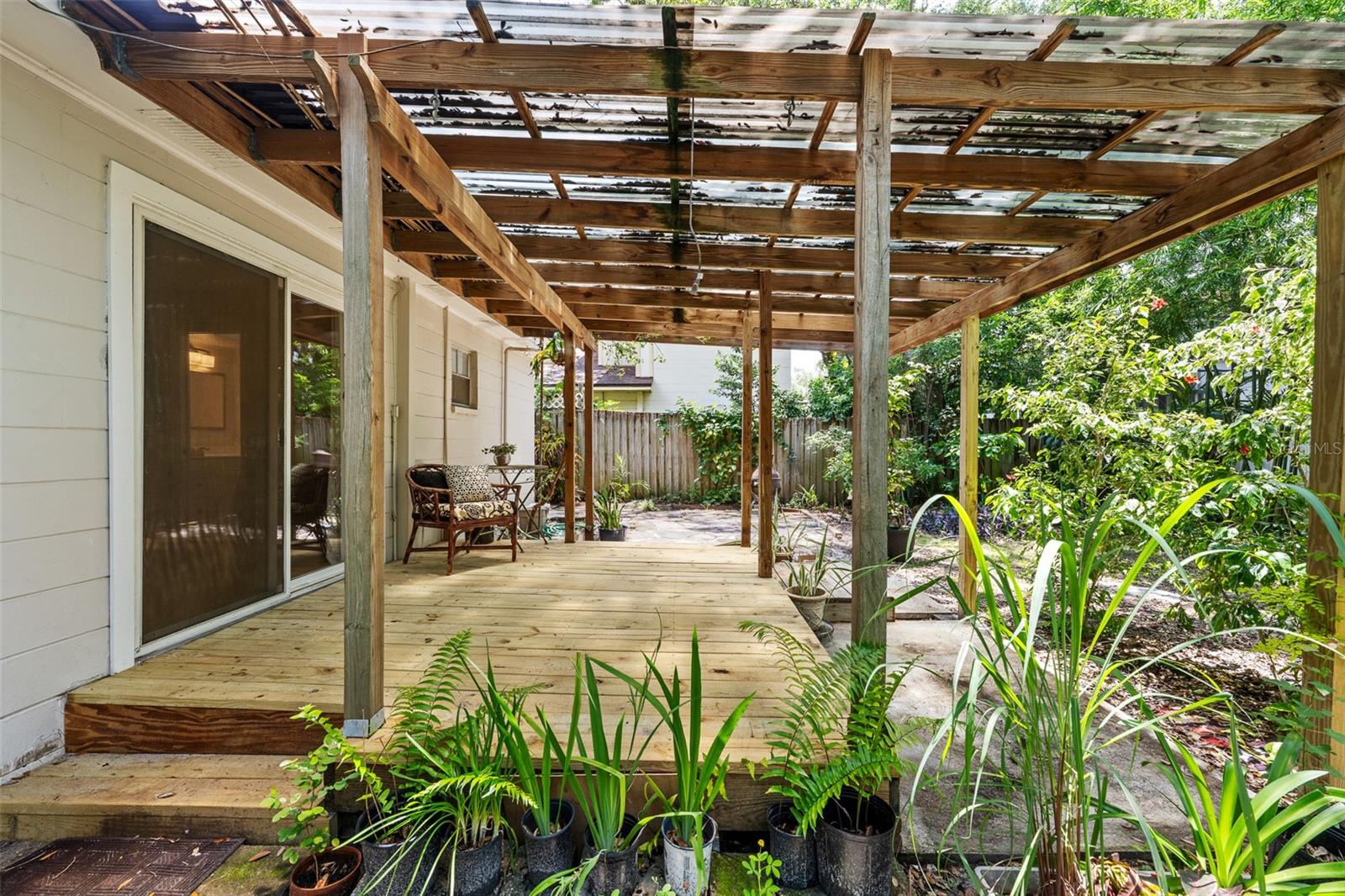 Large Covered Deck direct access from primary bedroom