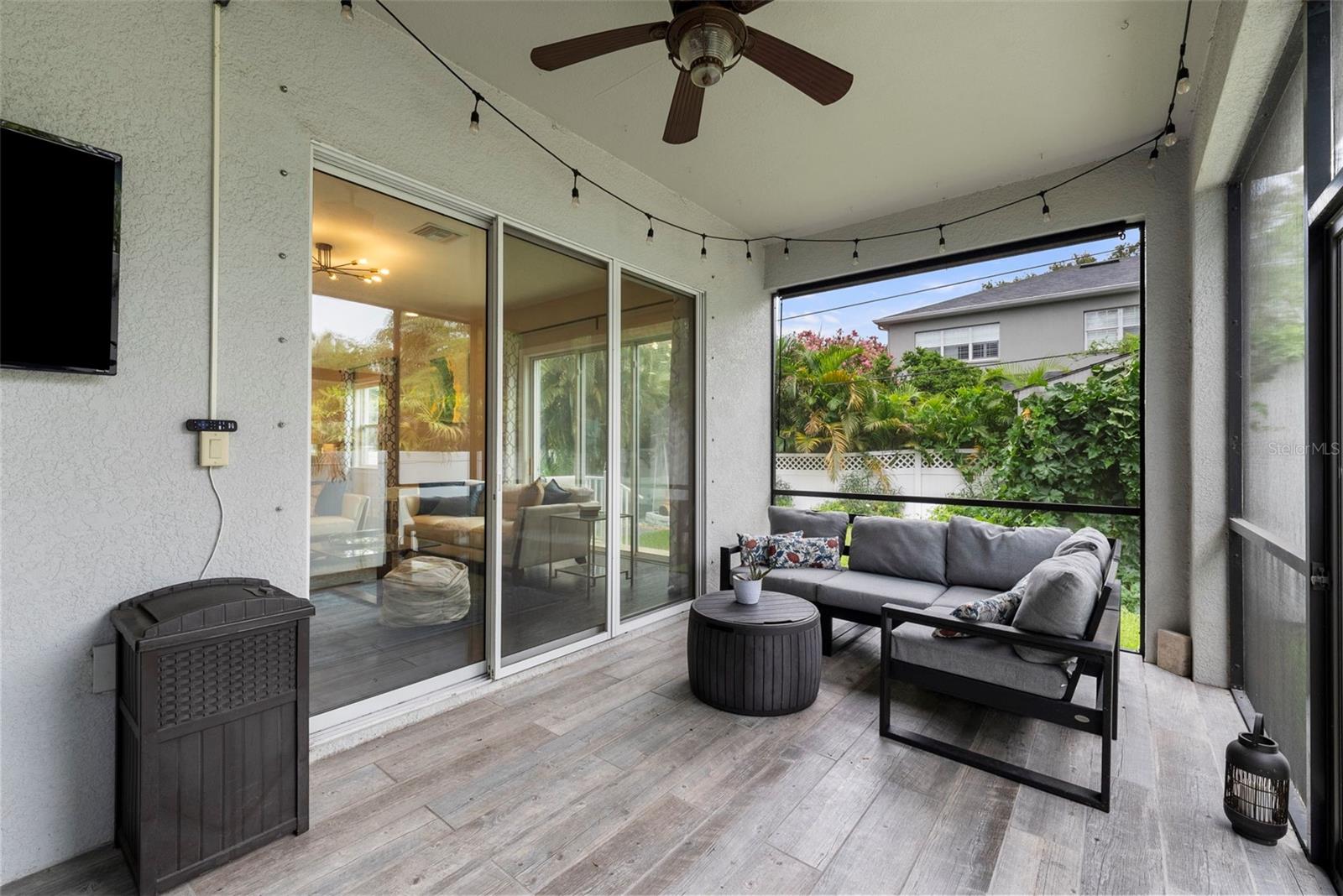 Spacious covered screen porch off great room