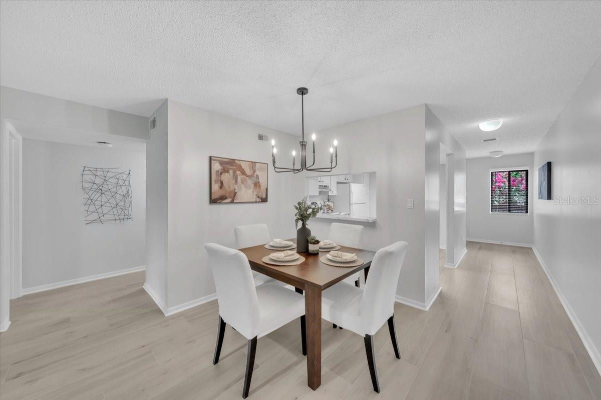 Hallway to a split floor plan. Master bedroom on the left and guest bedroom towards the right