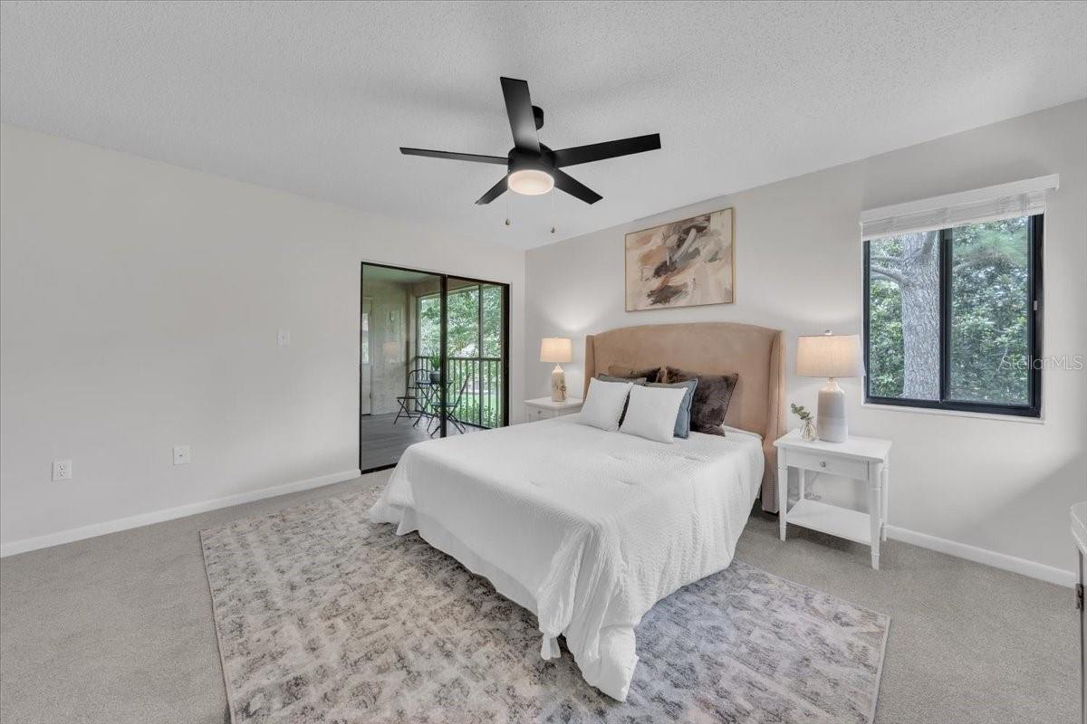 Master bedroom with access to the balcony