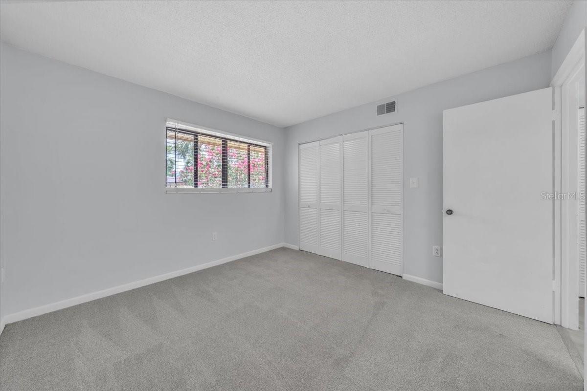 Guest bedroom with new carpet