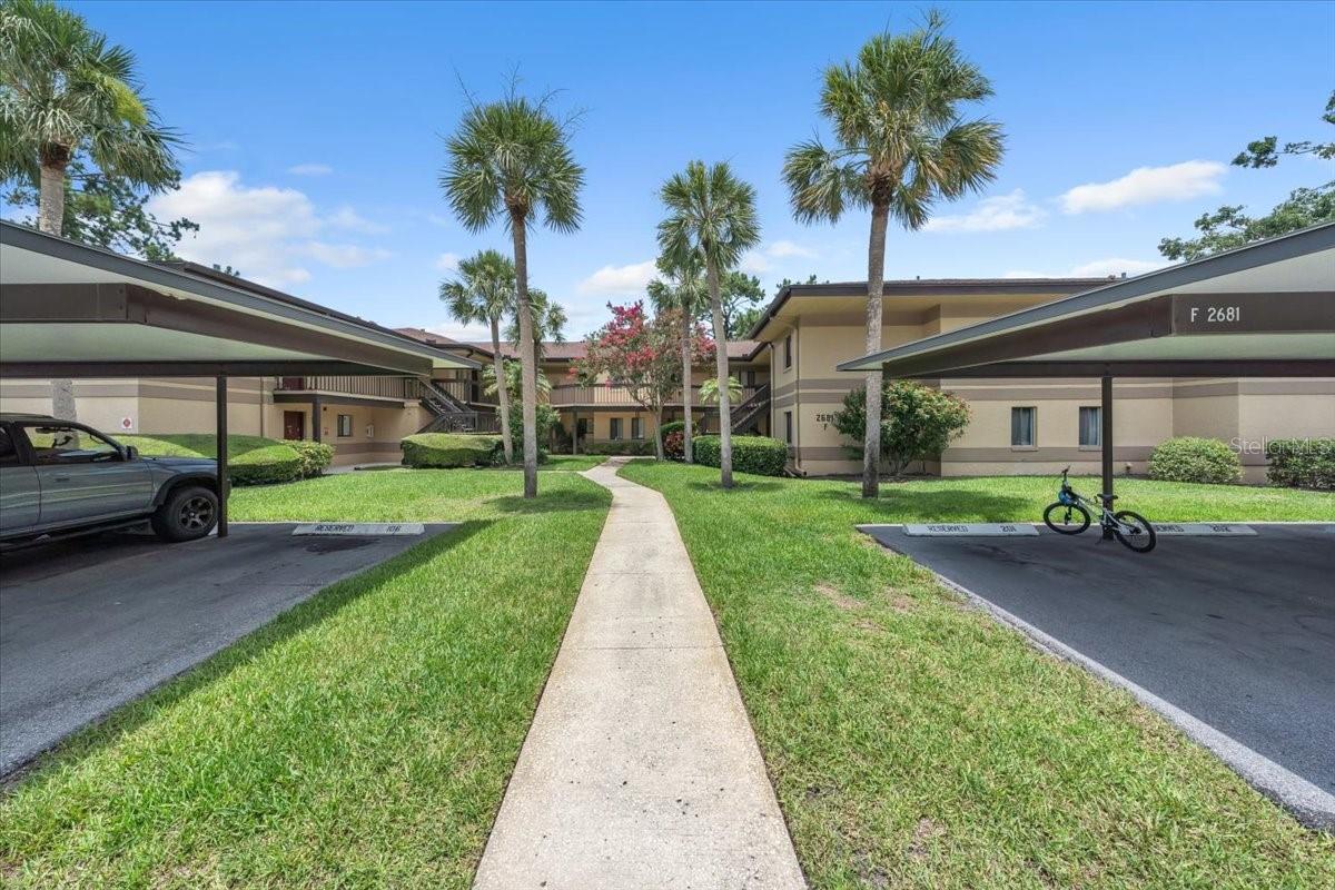 A designated covered carport space deeded to the Unit