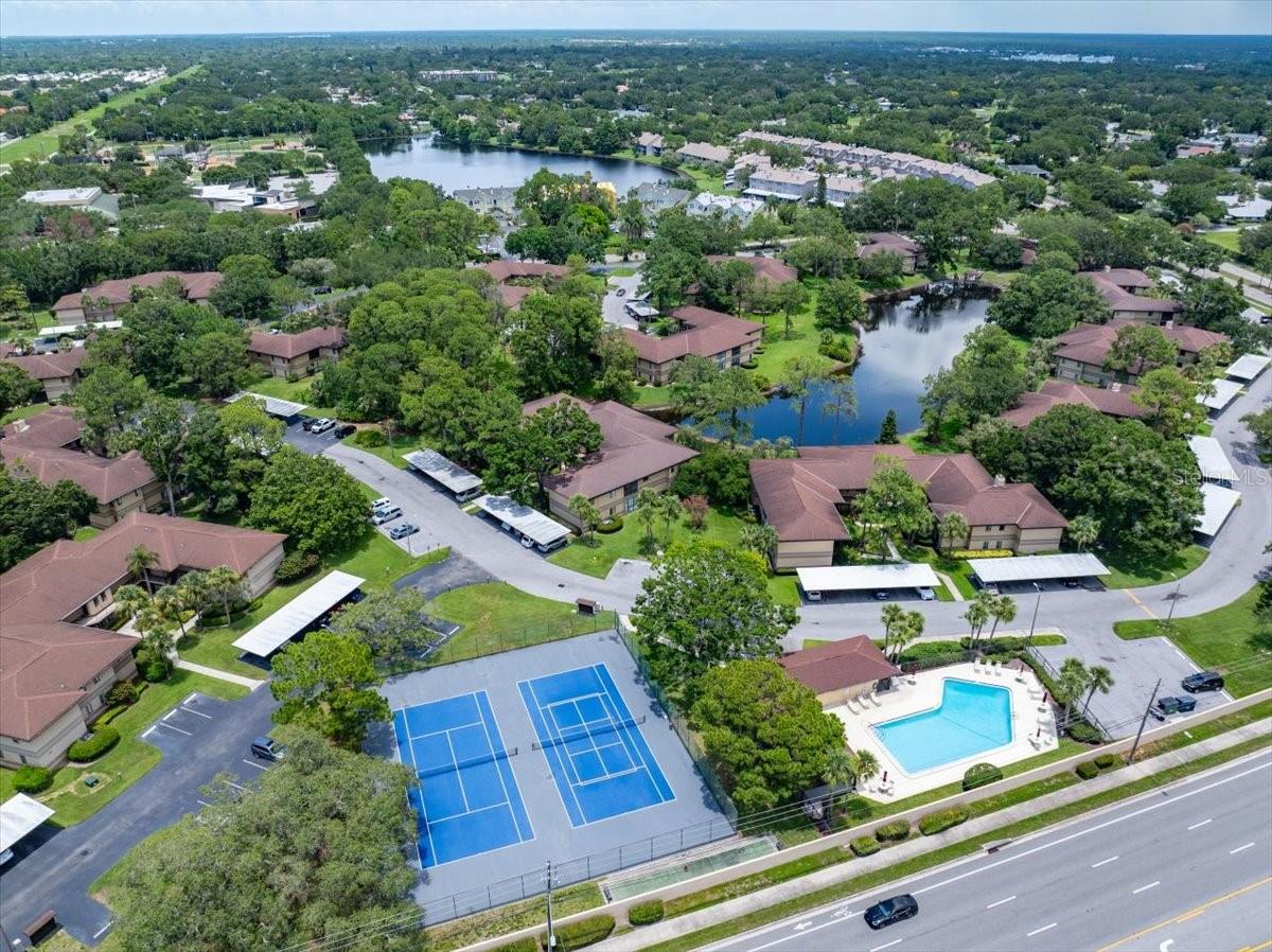 Amenities are just around the bend: Pool, shuffleboard, car wash, tennis courts, and pickleball