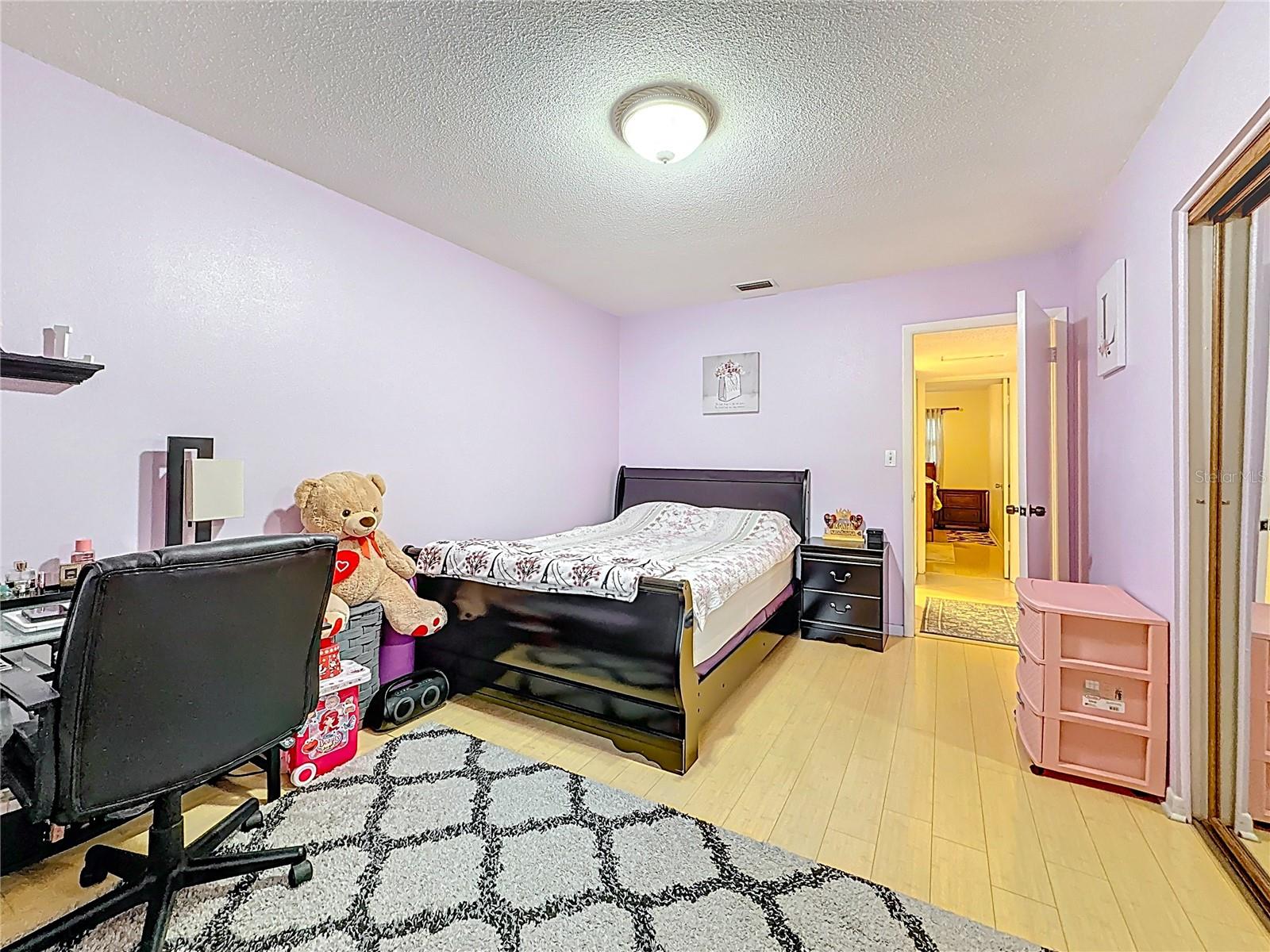 It is large enough for a king or queen bed.