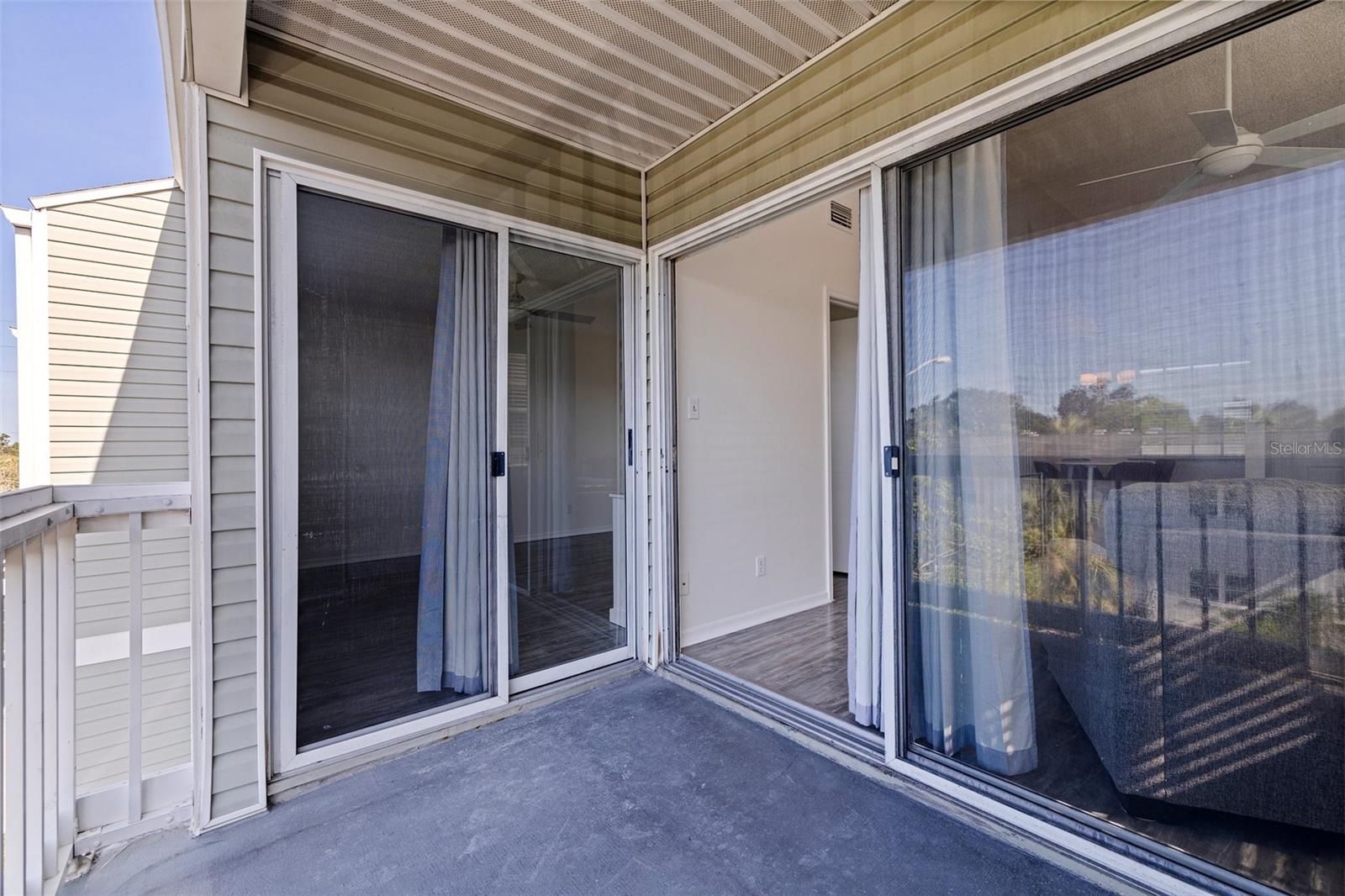 Private balcony accessible from Main Bedroom and Living Room