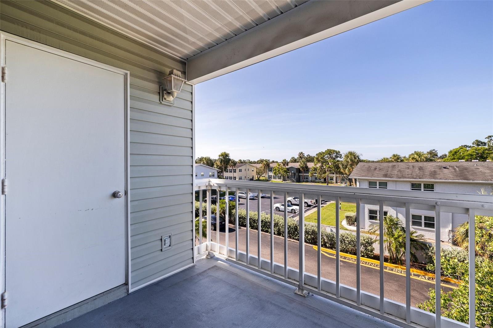 Private balcony accessible from Main Bedroom and Living Room