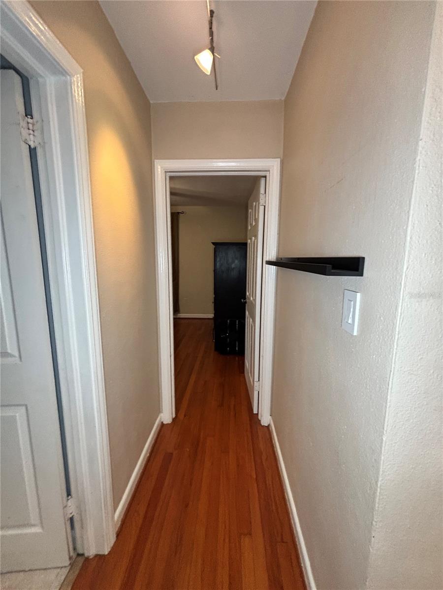 hallway (connects bedrooms w/ bathroom)