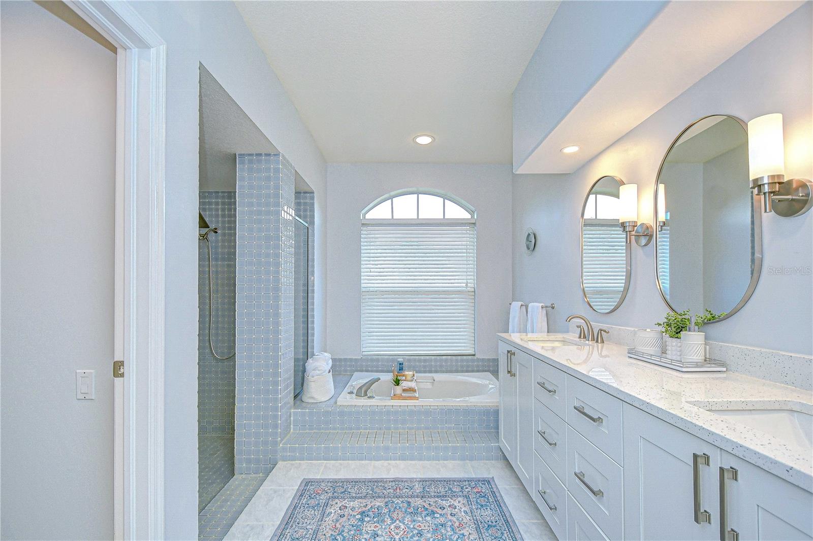 Primary Bathroom has shower, tub, New cabinets.