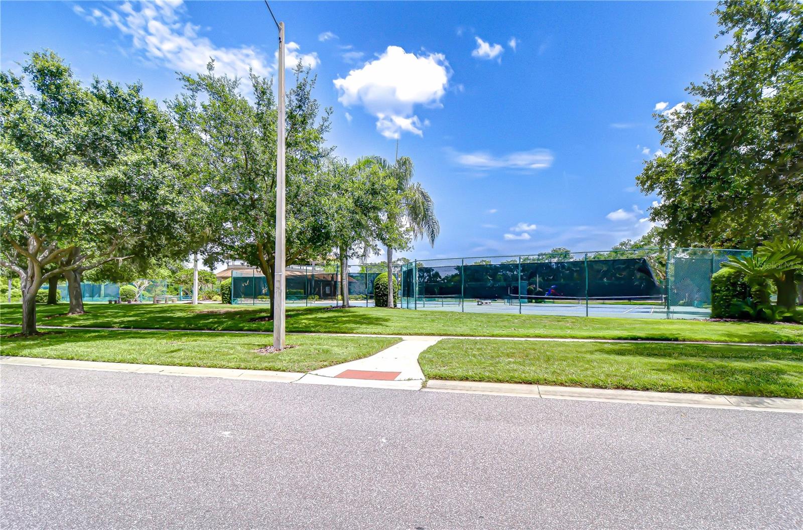 Tennis courts for community is right acroos the street.