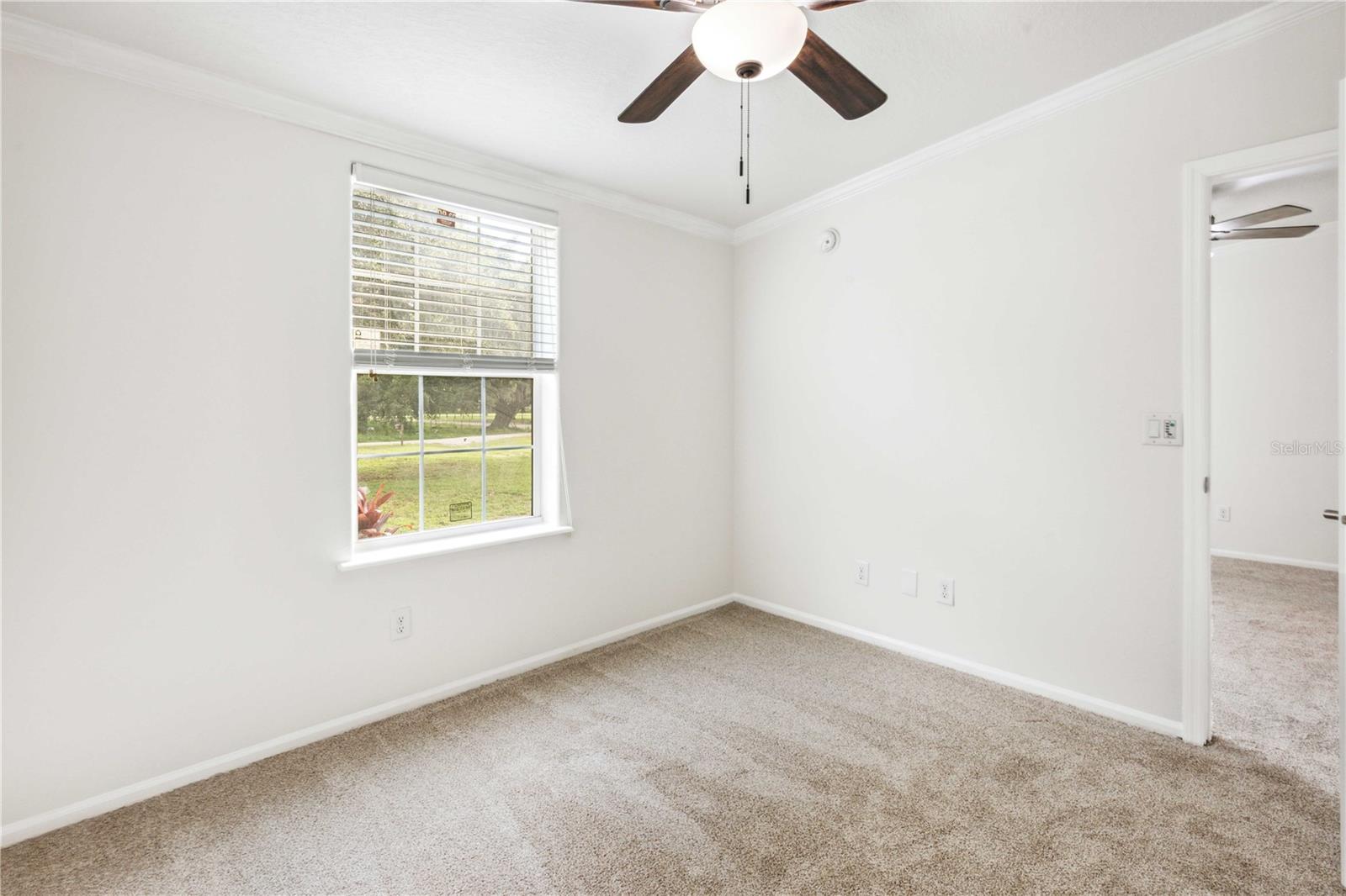 The flex room leads directly to bedroom two.
