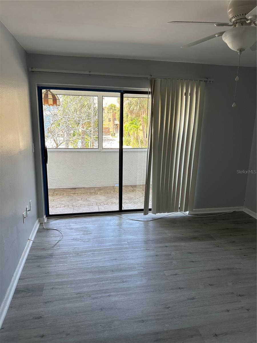 Master bedroom with porch view.