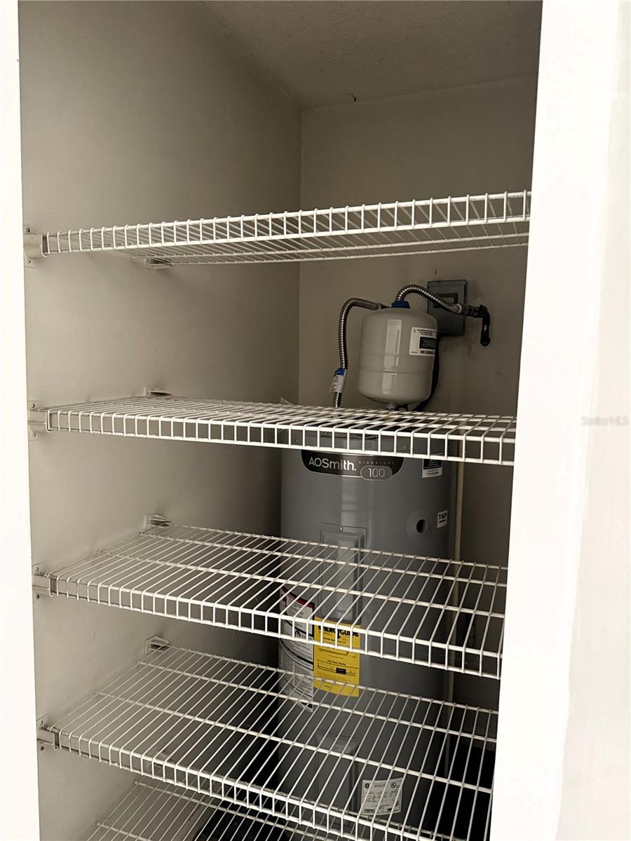 SECOND FLOOR HOT WATER HEATER AND CLOSET