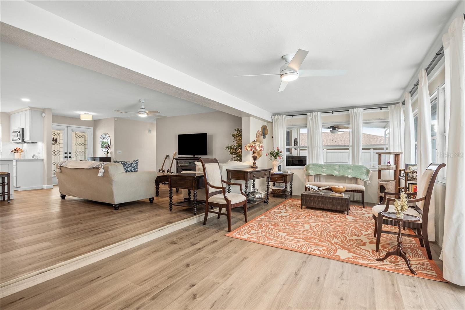 At the back of the home is this amazing Sunroom!    What will you use it for?