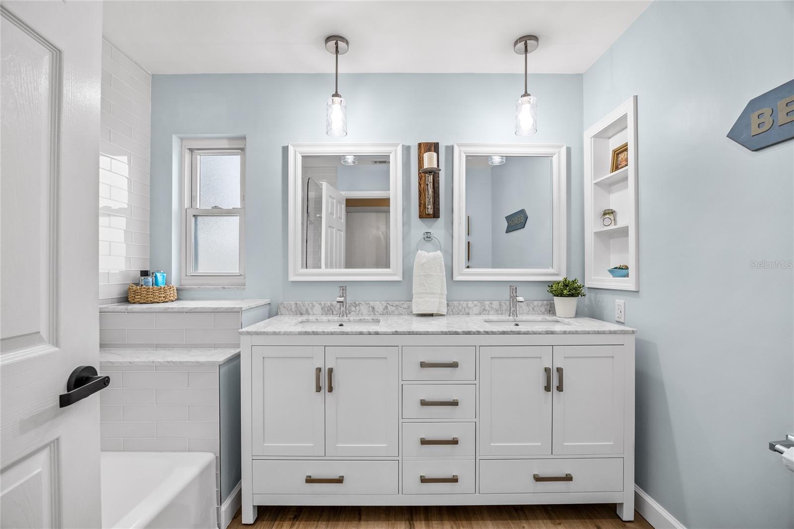 The Guest Bathroom has also been fully updated from Top to Bottom and has a beautiful double sink vanity as well as a Tub/Shower combo