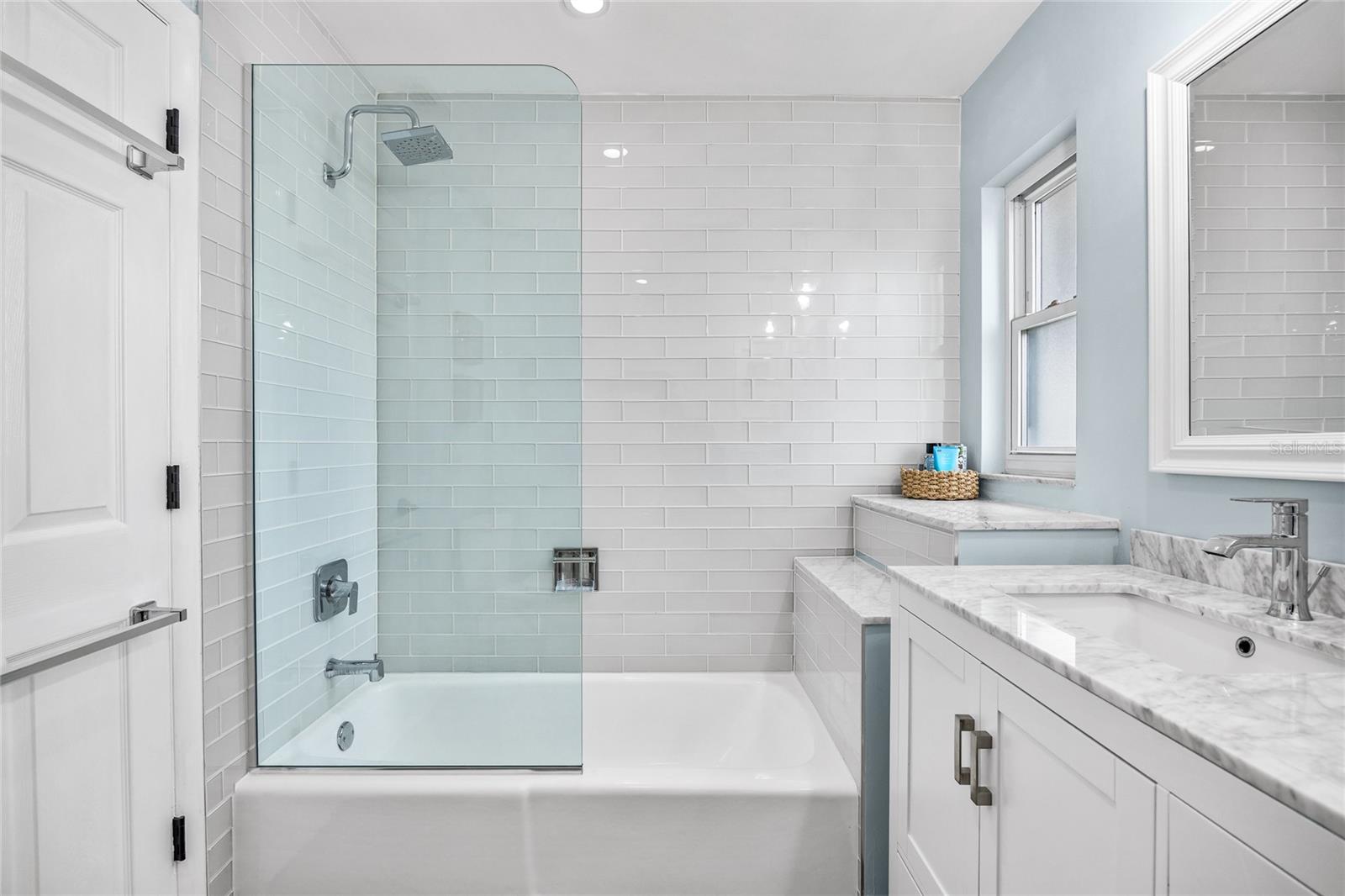 View of Tub/Shower Combo in Guest Bathroom