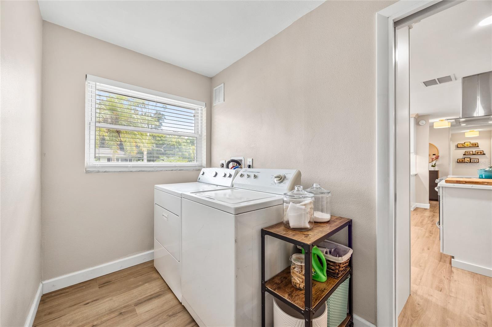 This Fairway Estates home has a nice surprise with this Inside Laundry Room!    So many of the homes still have the laundry in the garage!