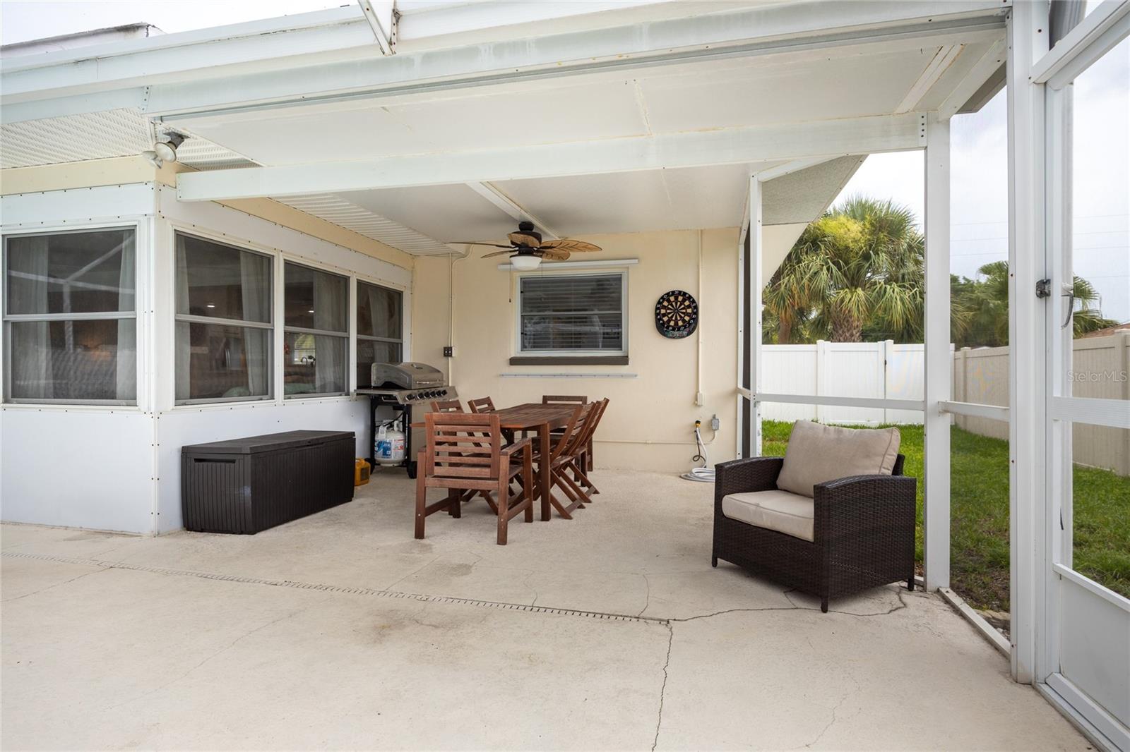 This covered area in the lanai is perfect for taking a break from the sun or summer rain showers!