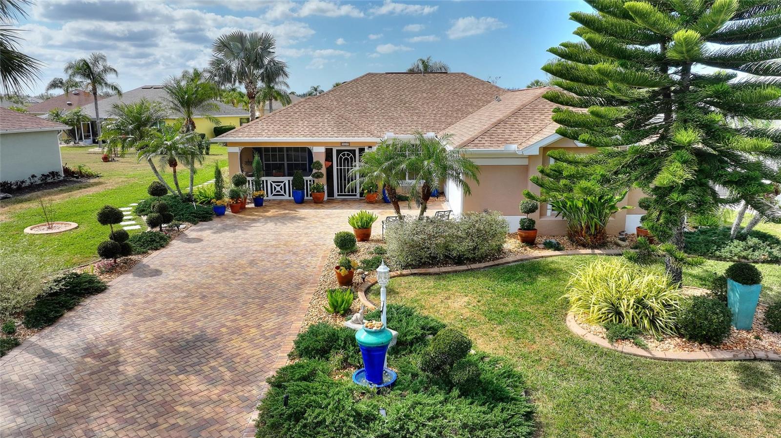 Beautifully landscaped home in Caloosa Creek!  Large pavered driveway and custom curbing.