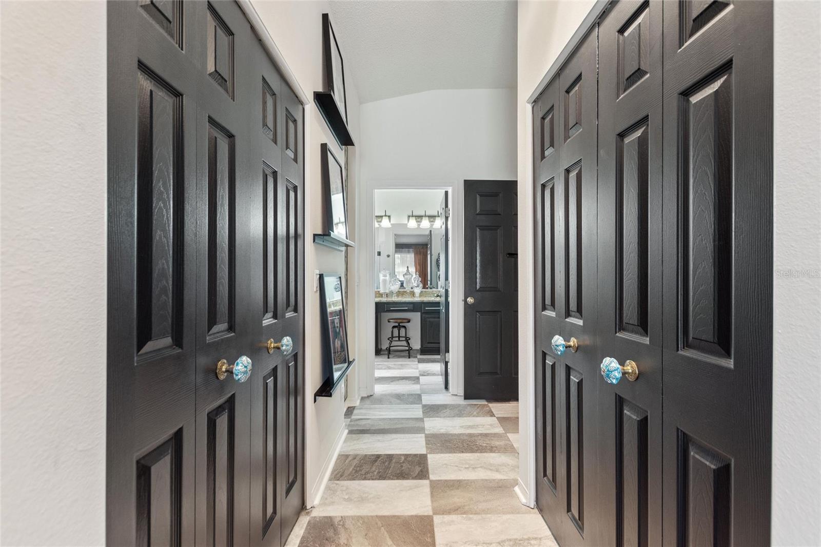 Two large walk in closets are adjacent to the bedroom and bathroom.