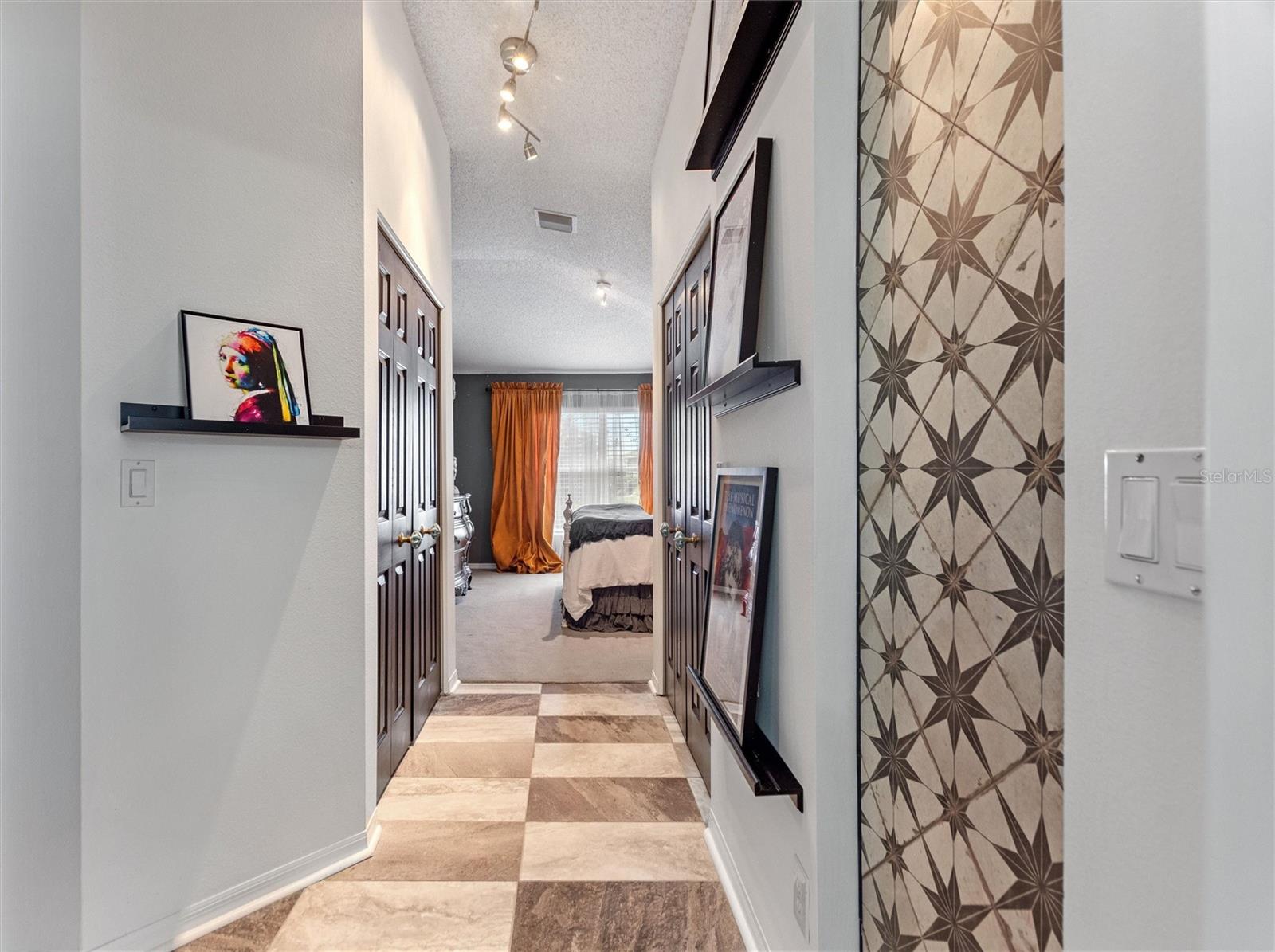Looking from the bathroom into the bedroom.