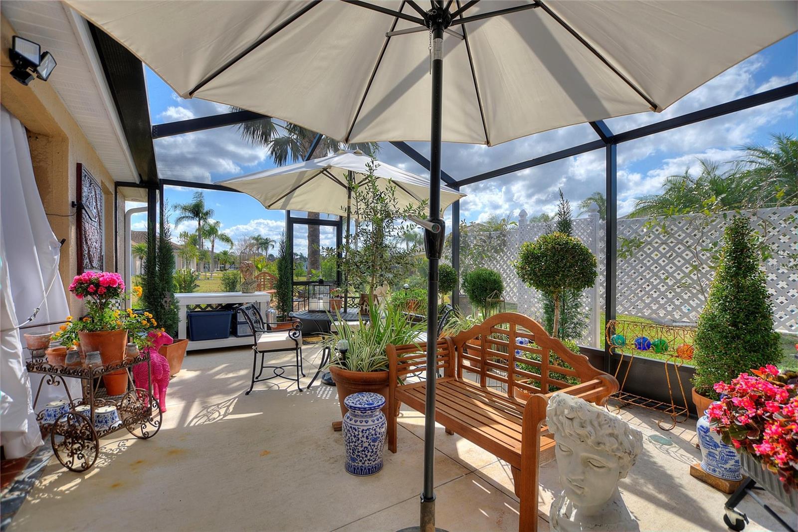 Fully screened with a concrete floor, this area is perfect for plantings, jacuzzi or a party.