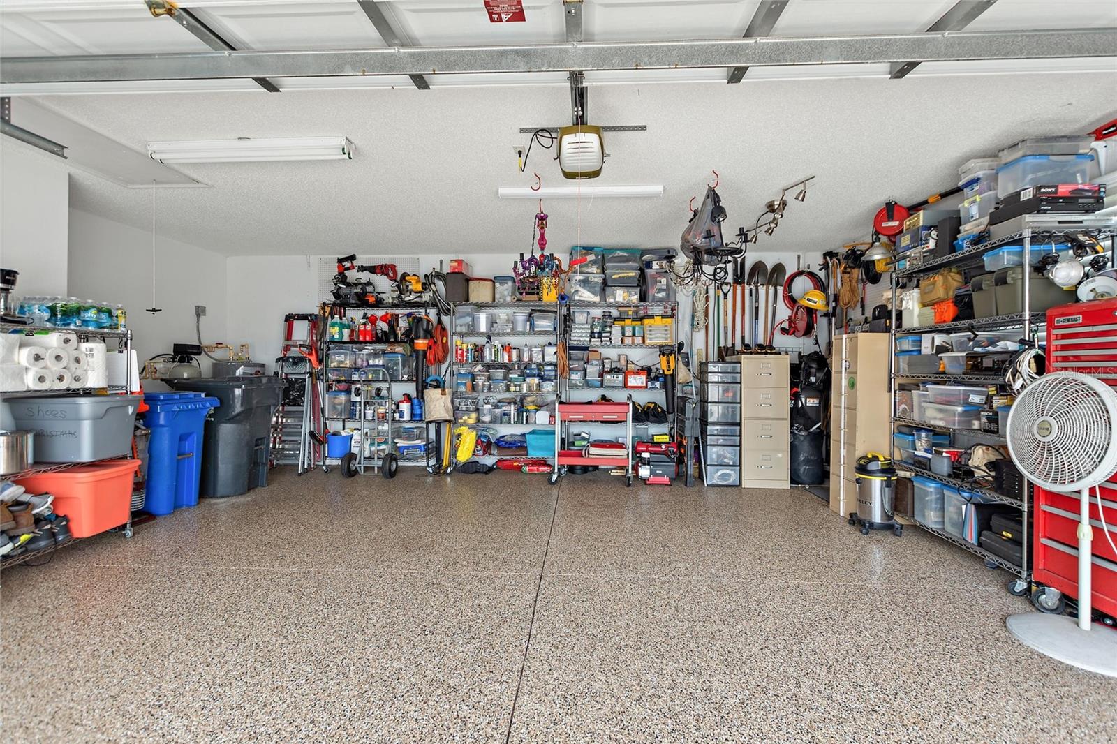 Garage is oversized with beautiful epoxy flooring!