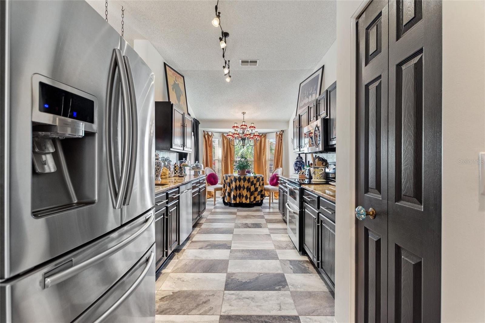 The kitchen is spectacular with stainless steel appliances, double oven and many elegant features.