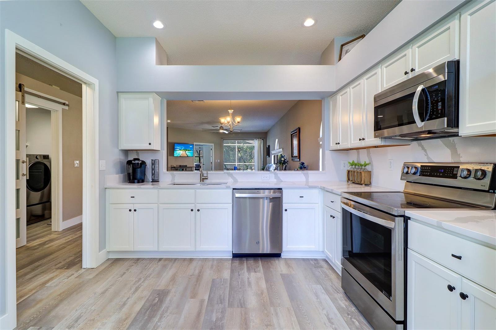 Kitchen view out to dining and living areas
